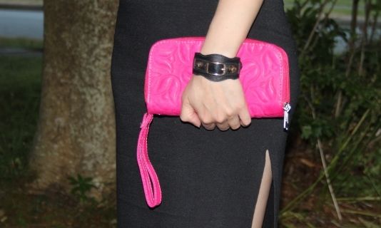 pop of pink details hot pink wristelet from mexico, balenciaga giant hardware bracelet